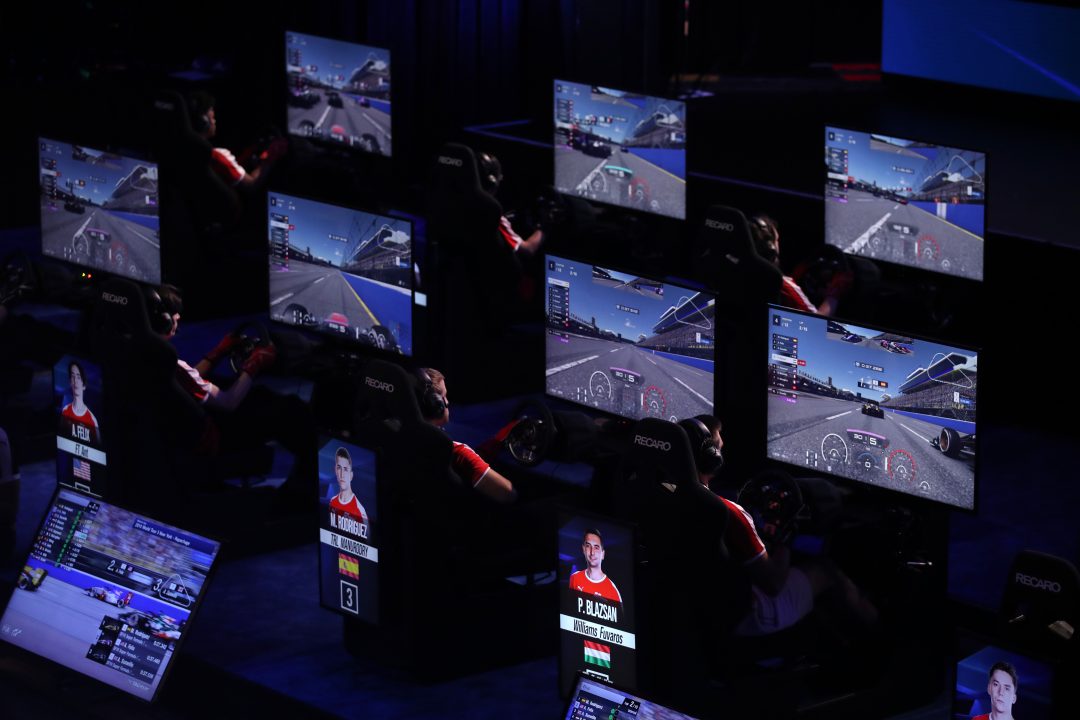 NEW YORK, NEW YORK - AUGUST 25: Drivers compete in the repechage race during the FIA Nations Cup Finals during the Gran Turismo World Tour Event at the PlayStation Theater on August 25, 2019 in New York City. (Photo by Christian Petersen - Gran Turismo/Gran Turismo via Getty Images)